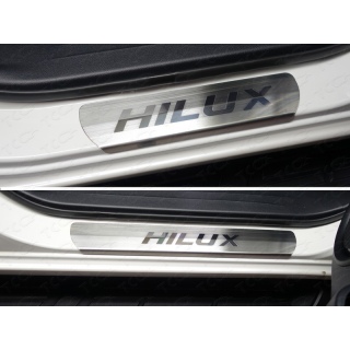 Накладки на пороги (лист шлифованный с надписью Hilux) TOYOTA Hilux (Тойота Хайлюкс) с 2015 года