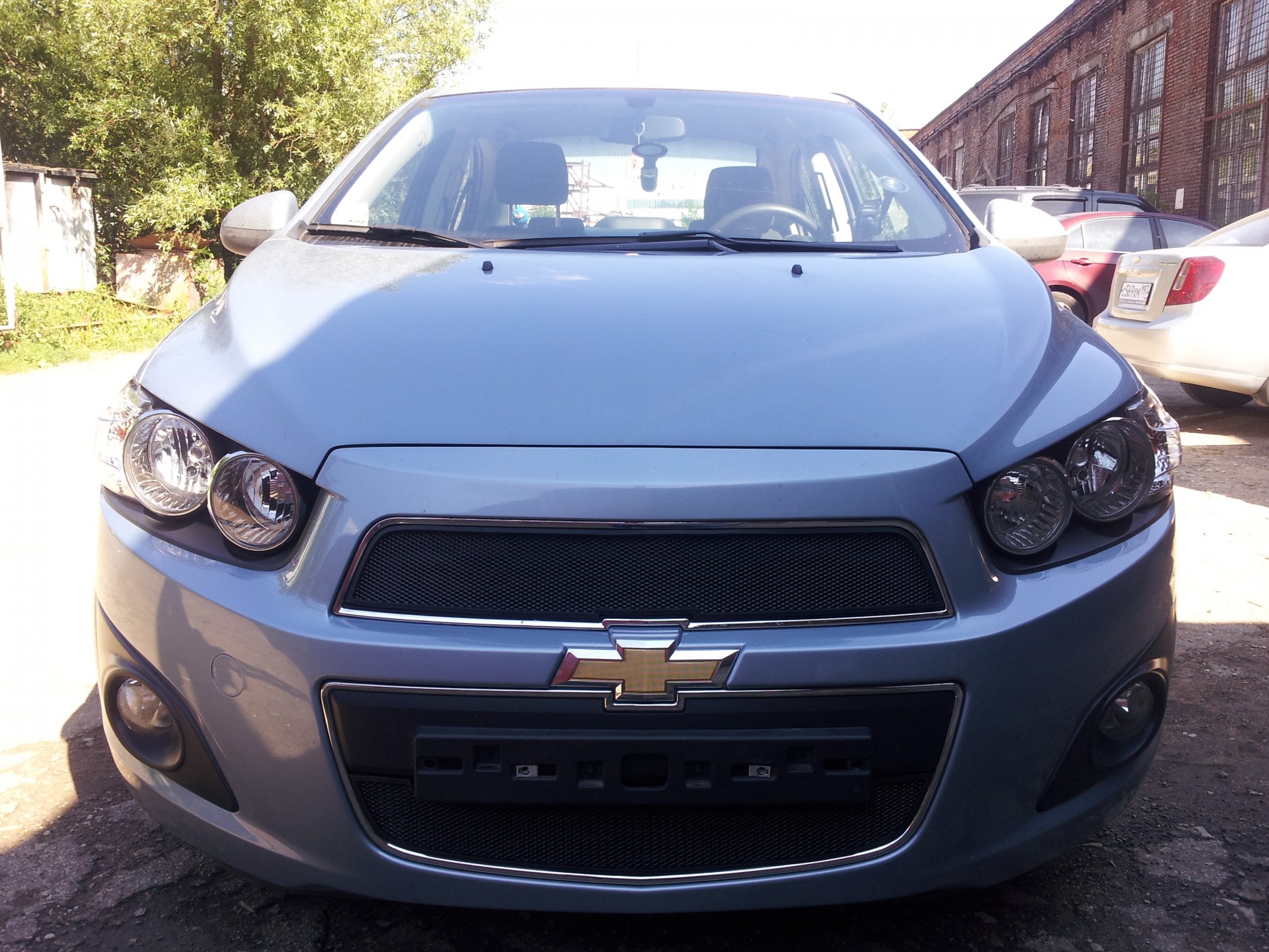 Решетка радиатора авео т300. Защита радиатора Chevrolet Aveo 2012-2015. Aveo 2012 решетка радиатора. Защита радиатора Шевроле Авео. Шевроле Авео 2012.