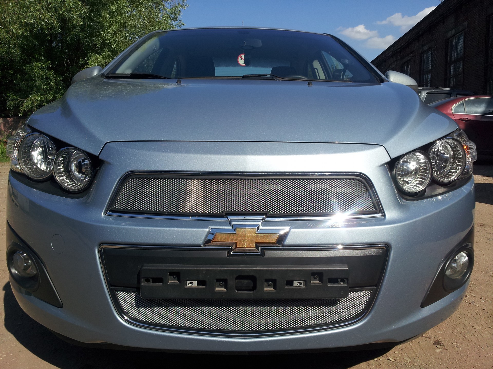 Решетка радиатора авео т300. Решетка радиатора Chevrolet Aveo t300. Решетка радиатора Шевроле т300. Aveo 2012 решетка радиатора. Защита радиатора Шевроле Авео т300.